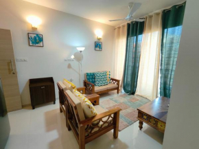 Glistening 2BHK Pool View, Resort Living, 10 mins from Dabolim Airport by Zennova Stays